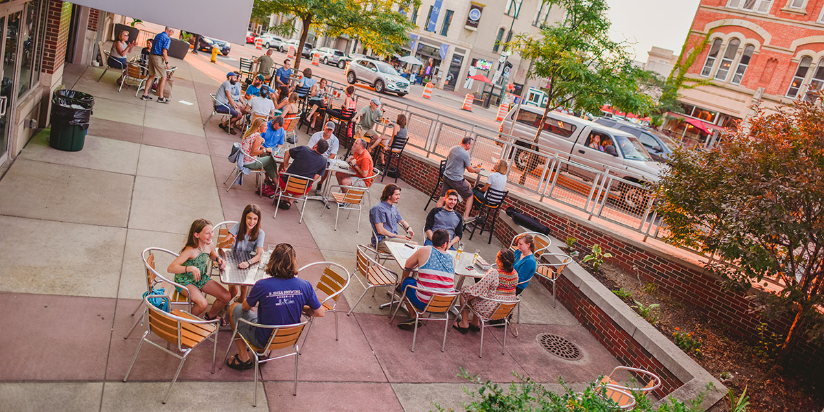 An aerial image of the Akronym Brewing patio on Market Street in downtown Akron.