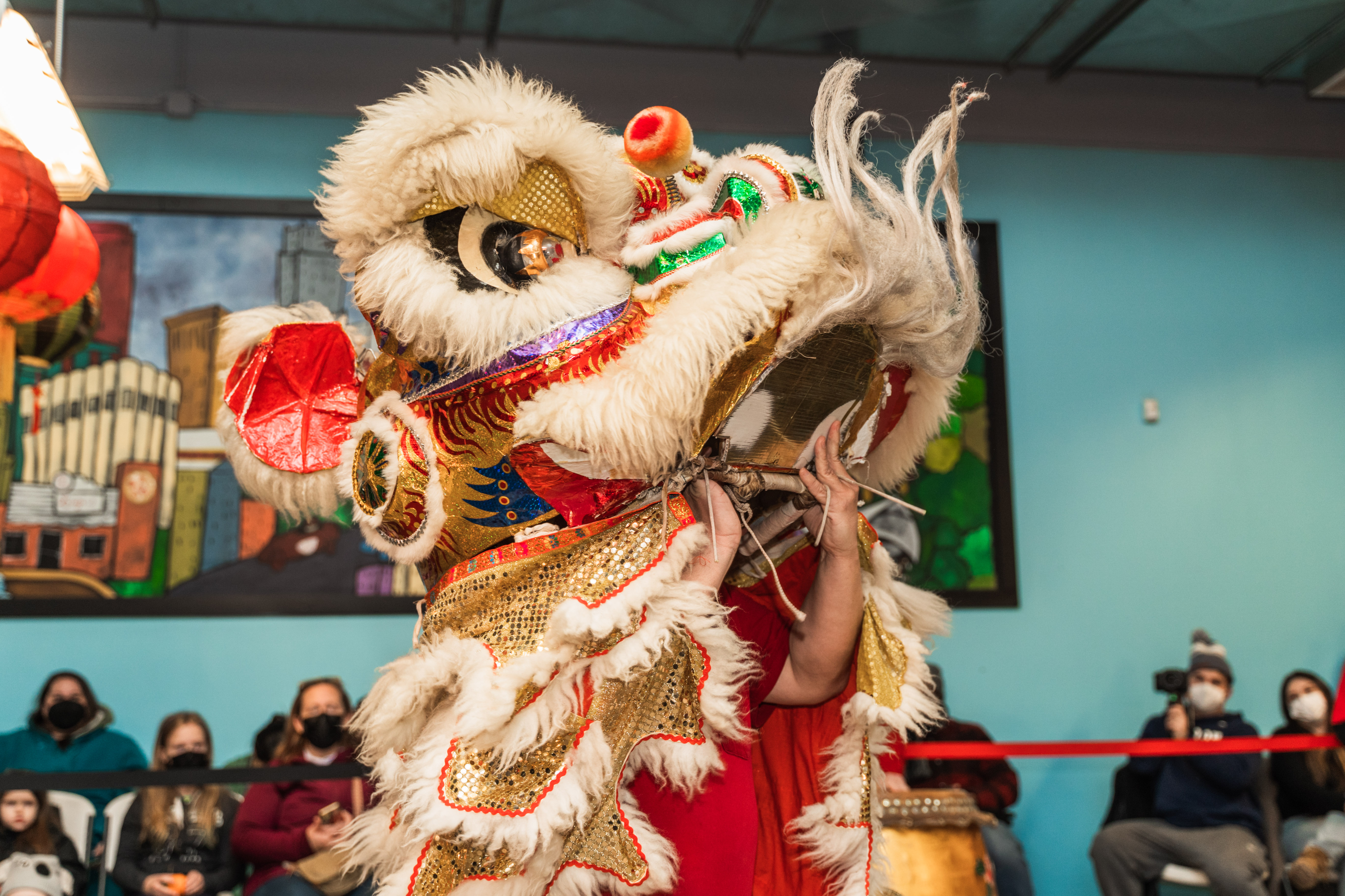 A performer inside a traditional Chinese Lion Dance costume