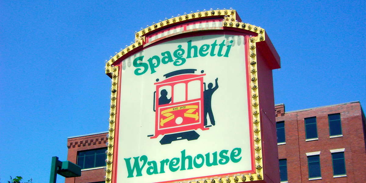 An image of the Spaghetti Warehouse sign outside of the downtown Akron restaurant.