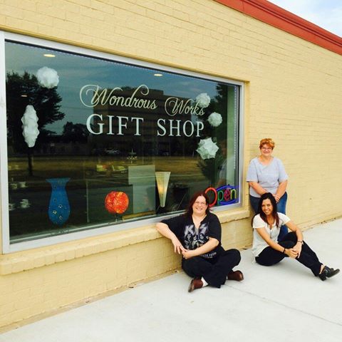 Sherrie Phillips and her team in front of the gift shop on Front Street.